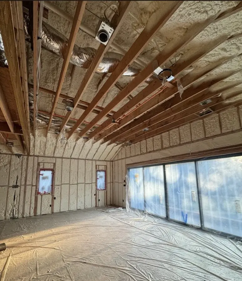 Interior walls and ceiling insulated with spray foam during new construction in Bluffdale